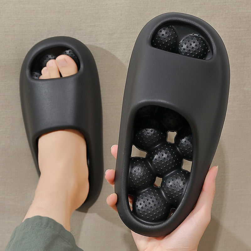 Black Massage Slipper Slides on hands